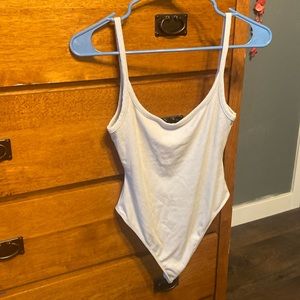 All things golden luxe rib low back bodysuit